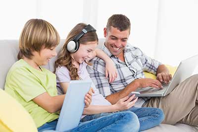 Family around laptop